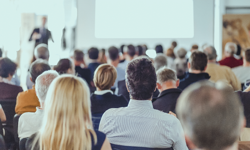 rear-view-unrecognizable-people-audience-conference-hall